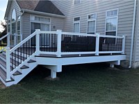 <b>Trex Lava Rock Decking with White Washington Vinyl Railing with collars on Black Aluminum Balusters-Extra Wide Steps</b>